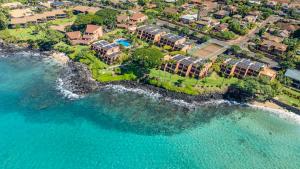 an aerial view of a resort near the ocean at Kuleana Club #510 - Ocean View -1 bedroom & 1 bathroom - 2nd Floor in Kahana