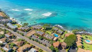 an aerial view of a resort next to the ocean at Kuleana Club #510 - Ocean View -1 bedroom & 1 bathroom - 2nd Floor in Kahana