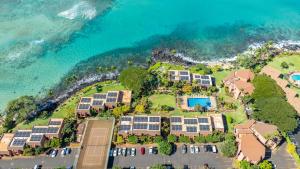 an aerial view of a resort next to the ocean at Kuleana Club #510 - Ocean View -1 bedroom & 1 bathroom - 2nd Floor in Kahana