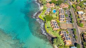 an aerial view of a resort next to the ocean at Kuleana Club #510 - Ocean View -1 bedroom & 1 bathroom - 2nd Floor in Kahana