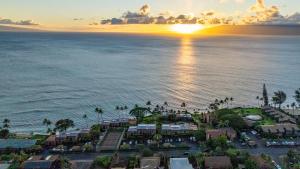an aerial view of a resort next to the ocean at Kuleana Club #510 - Ocean View -1 bedroom & 1 bathroom - 2nd Floor in Kahana