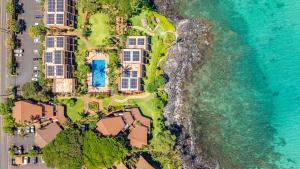 an aerial view of a house on the beach at Kuleana Club #510 - Ocean View -1 bedroom & 1 bathroom - 2nd Floor in Kahana