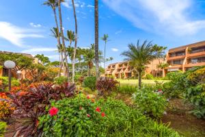 a view of the resort from the garden at Kuleana Club #510 - Ocean View -1 bedroom & 1 bathroom - 2nd Floor in Kahana
