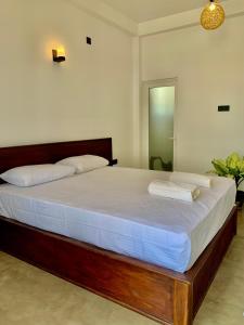 En eller flere senge i et værelse på Thaproo Bay Hiriketiya + 108 billeder