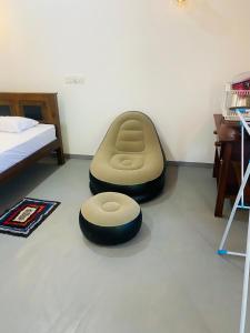 Postel nebo postele na pokoji v ubytování Bloom Guest House