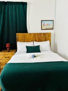 Katil atau katil-katil dalam bilik di Vuyomat Guest House 1