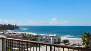 a view of the ocean from the balcony of a hotel at Unit 13 Oceanic, Kings Beach in Caloundra