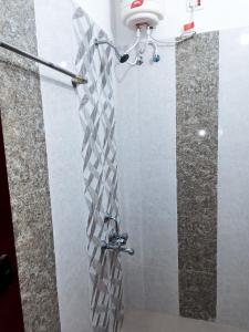 Ένα μπάνιο στο Melba Homestay at Kodaigate
