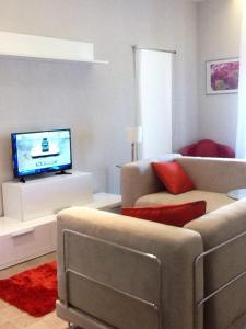 TV a/nebo společenská místnost v ubytování Taloshospitality + 29 fotografií