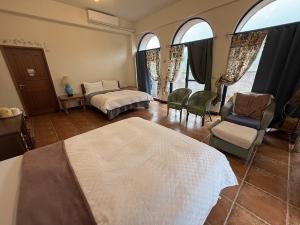 Postel nebo postele na pokoji v ubytování Tuscany Garden B&B