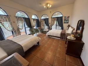 Postel nebo postele na pokoji v ubytování Tuscany Garden B&B