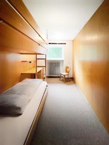 Postel nebo postele na pokoji v ubytování WAGNERS Hotel im Fichtelgebirge
