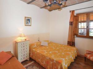 Posteľ alebo postele v izbe v ubytovaní Villa in Montalbano with Scenic Views