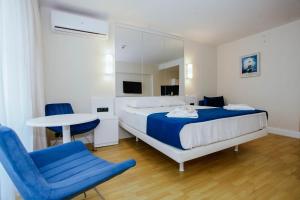 Giường trong phòng chung tại Batumi Sea Line Aparthotels