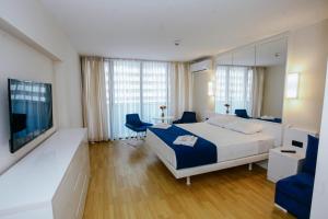 Giường trong phòng chung tại Batumi Sea Line Aparthotels