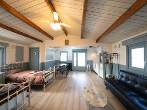 Postel nebo postele na pokoji v ubytování Cottage Morinokokage