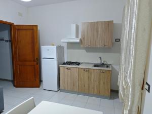 Kuchyňa alebo kuchynka v ubytovaní Silvia Casa Vacanze