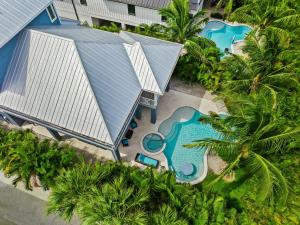 an overhead view of a building with a swimming pool at Endless Summer in Anna Maria