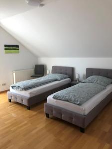 Ένα ή περισσότερα κρεβάτια σε δωμάτιο στο Ferienhaus BENNER