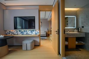Salle de bains dans l'établissement Hilton Garden Inn Shanghai Caoyang