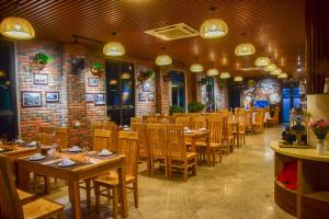 Restoran atau tempat lain untuk makan di Cozynibi Hotel