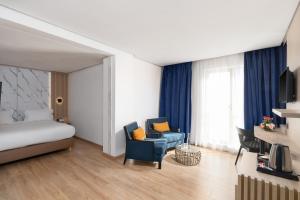 Un ou plusieurs lits dans un hébergement de l'établissement Rihab Hotel