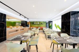 Restaurant ou autre lieu de restauration dans l'établissement Rihab Hotel