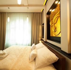 Cama o camas de una habitación en Premium Buddha Apartment