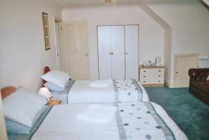 Кровать или кровати в номере Westgrange House Bed & Breakfast +12 фотографий