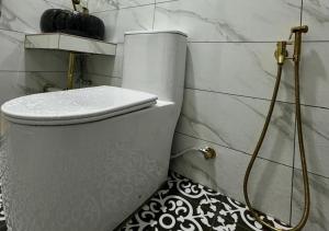 Koupelna v ubytování Tiny House Dferry With Private Pool OR 4 Room Homestay Jerantut Wifi Full Aircond