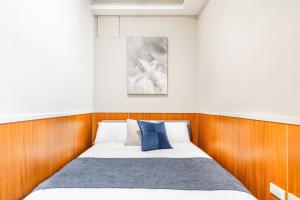 Ένα ή περισσότερα κρεβάτια σε δωμάτιο στο Jiufen Harmony Inn