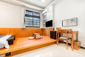 Μια τηλεόραση ή/και κέντρο ψυχαγωγίας στο Jiufen Harmony Inn