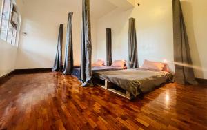 Postel nebo postele na pokoji v ubytování QBee Manila- Airport Nearby, Cozy Hostel & Homestay, 3rd Floor Shared Space