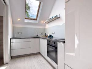 Kuchyň nebo kuchyňský kout v ubytování APARTAMENT NARNIA 7a