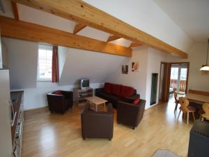 A seating area at Apartment St Margarethen near Ski Lift