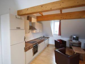 A kitchen or kitchenette at Apartment St Margarethen near Ski Lift