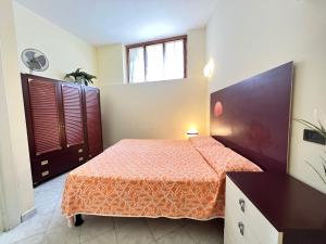 Postel nebo postele na pokoji v ubytování Villa Rocca - appartamento 6