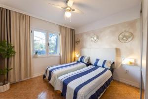 Posteľ alebo postele v izbe v ubytovaní Seaview Pool Villa with cinema up to 26