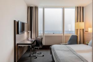 Postel nebo postele na pokoji v ubytování Garner Hotel Berlin - Spandau by IHG