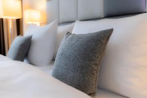Postel nebo postele na pokoji v ubytování Garner Hotel Berlin - Spandau by IHG
