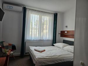 Posteľ alebo postele v izbe v ubytovaní "Hel" Wieniec Zdrój