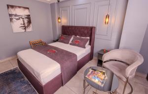 Letto o letti in una camera di Ruby Hotel