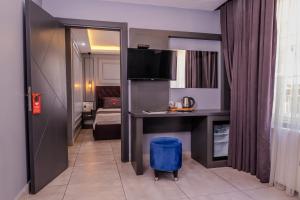 Letto o letti in una camera di Ruby Hotel