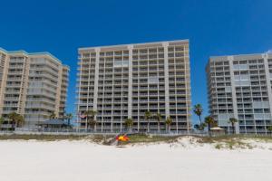 two tall buildings on the beach near the sand at Windward Pointe Condominiums in Orange Beach
