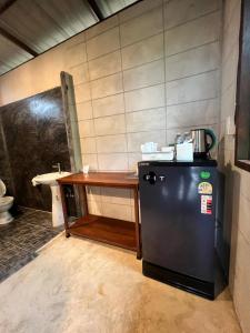 Kuchyň nebo kuchyňský kout v ubytování Tiger homestay 2 Phayam