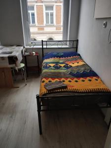 Katil atau katil-katil dalam bilik di Familienappartement in Zentrum