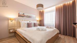 Postel nebo postele na pokoji v ubytování Flatbook - Seaside Apartments Albatross Tower