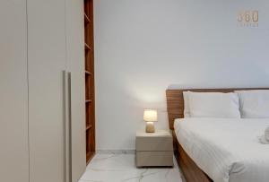 Krevet ili kreveti u jedinici u okviru objekta Stylish 1BR Apt with sofabed & backyard, Attard by 360 Estates