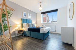 Ένα ή περισσότερα κρεβάτια σε δωμάτιο στο Stylish New Apartment - Free Wifi & Netflix - Parking 3MH