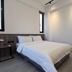 Letto o letti in una camera di 澎湖旅澄民宿 ph880Journey